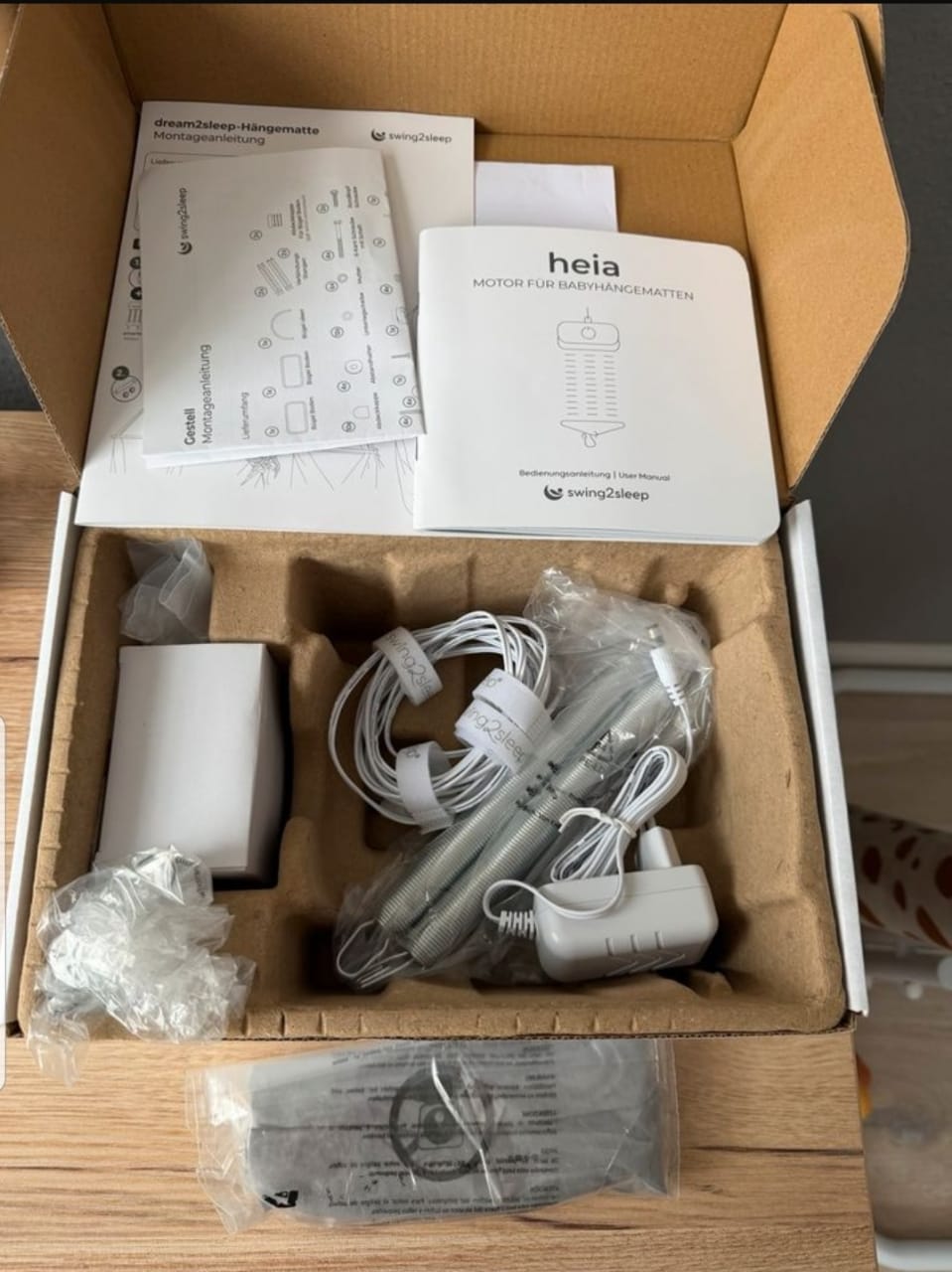 Berceau Swing2Sleep pour bébé, livré avec de nombreux accessoires
